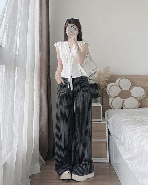 Cách phối đồ với quần ống rộng - Với áo peplum hoặc áo chiết eo