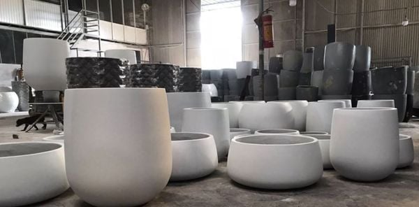 We offer a wide variety of fiber cement planters to suit any space