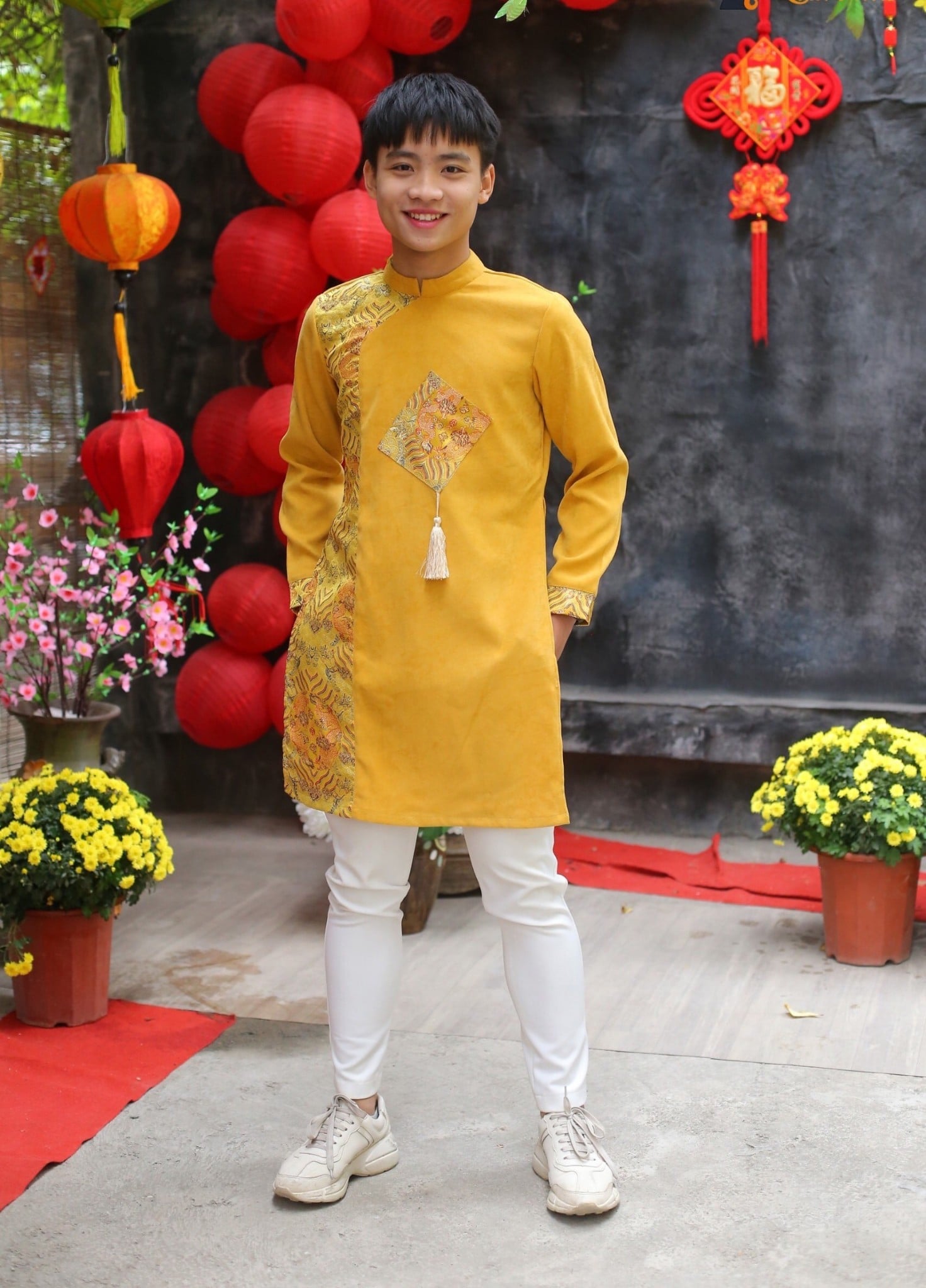 Mẫu áo dài tết cho bé trai dáng ngắn