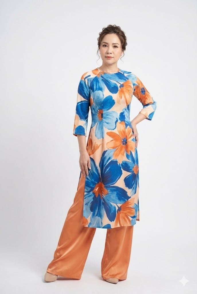 Áo dài trung niên dáng lỡ phối quần ống rộng