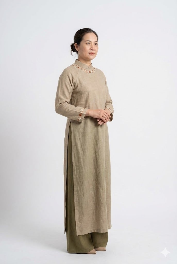 Áo dài trung niên chất liệu đũi thêu tay tối giản
