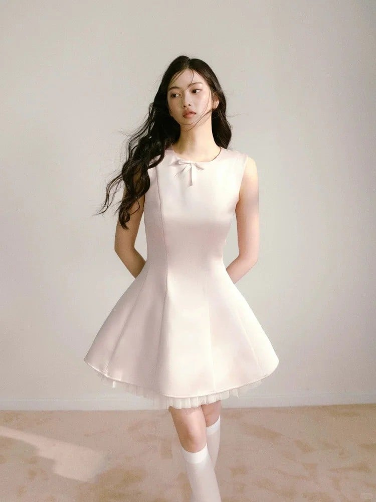 Đầm lụa satin chữ A thắt nơ ngực