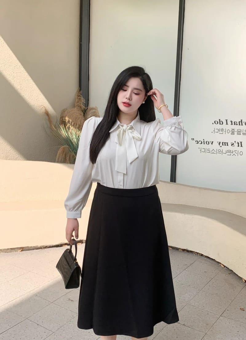 Người béo nên mặc váy nào?