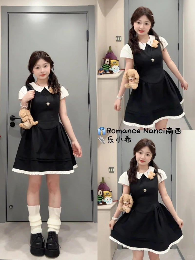 4. Váy liền cổ sơ mi đen + Tất trắng cao cổ + Túi gấu bông