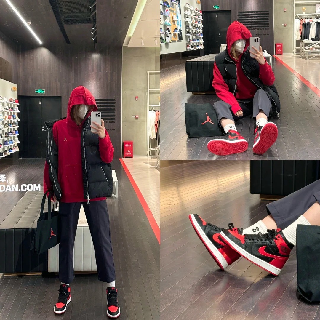 8. Hoodie đỏ + Gile phao đen + Quần tây + Giày Jordan 1 