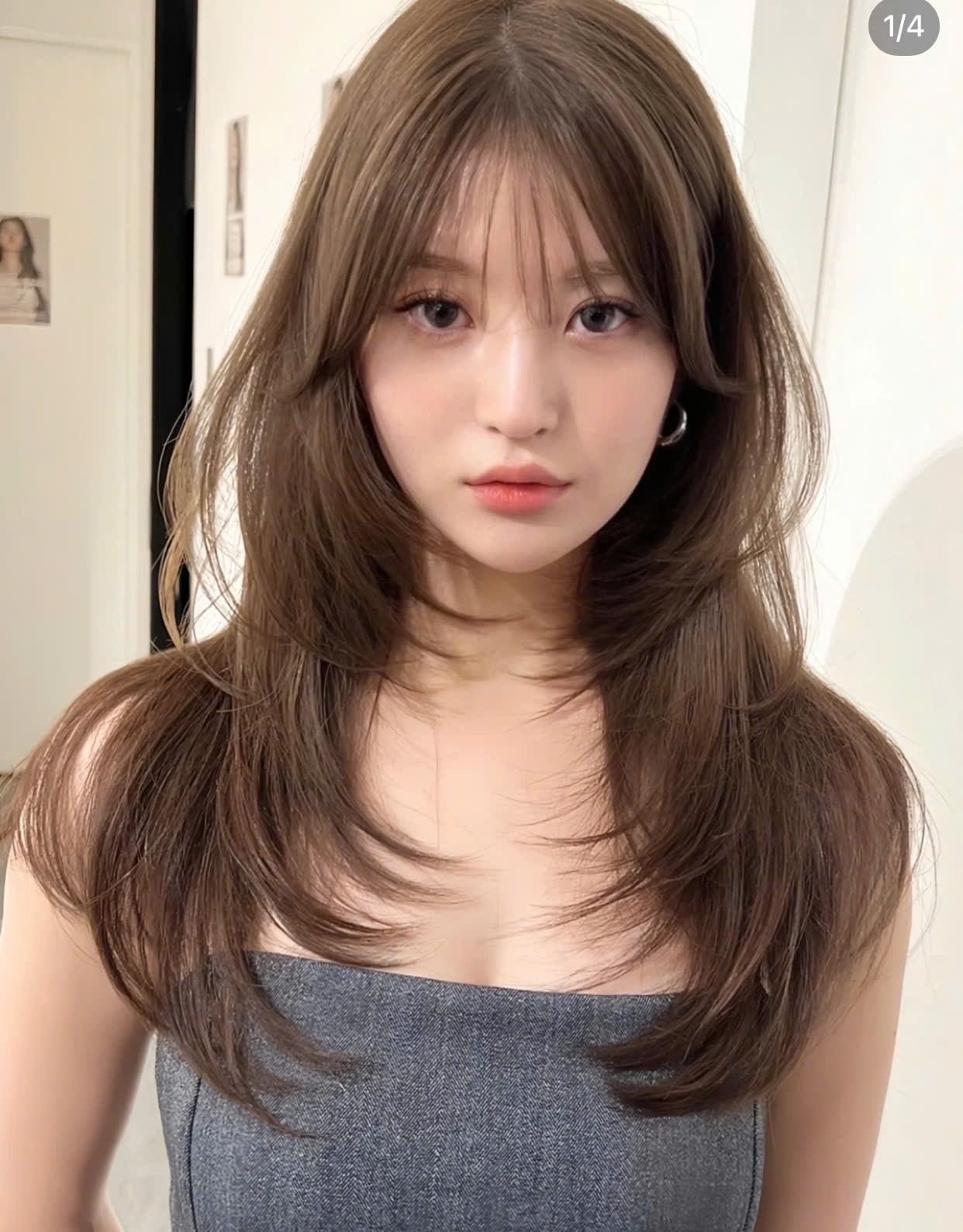 Tóc layer uốn cụp C màu nâu trà sữa với mái bay dài ngang ngực