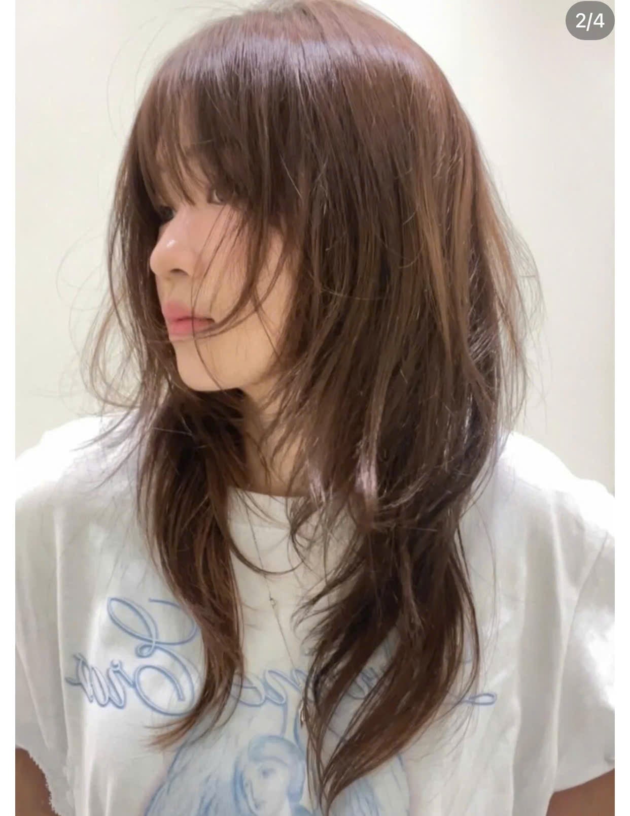 Tóc layer shag màu nâu socola cùng mái thưa rối dài qua vai