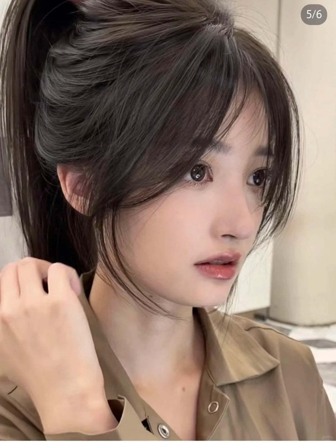 Tóc mái bay cho gương mặt tròn