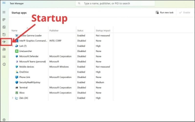 Trong cửa sổ Task Manager, chuyển sang tab Startup