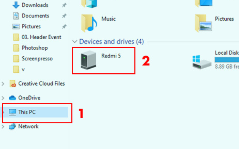 Trên laptop, mở This PC và chọn tên điện thoại
