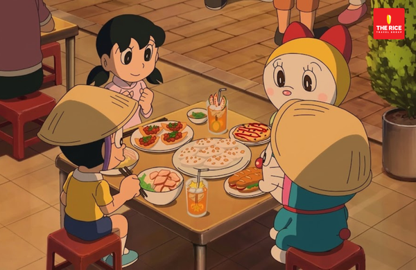 Doraemon and his friends looked very charming in their Vietnamese ao dai dresses and conical hats