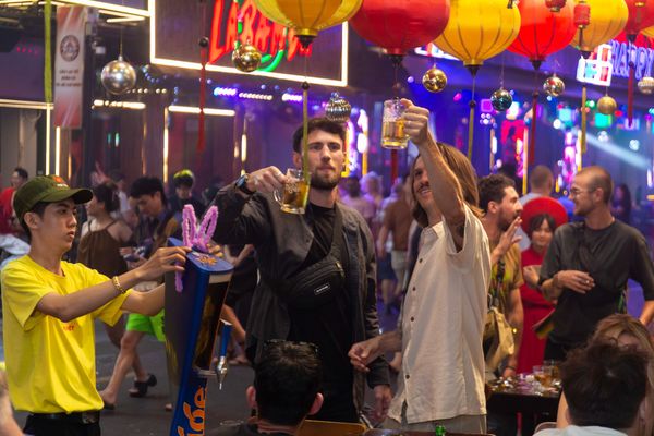 The area surrounding The Rice Hotel has many restaurants and bars, creating a lively atmosphere.