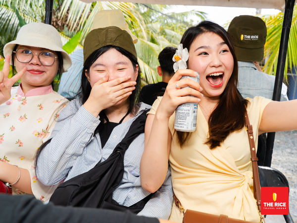 Passengers sit in tuk-tuks, admiring the roads of the Mekong Delta.