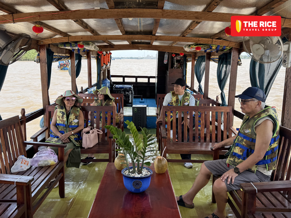 Tourists enjoy the Mekong Delta - Ben Tre - My Tho tour experience offered by The Rice Travel Group.