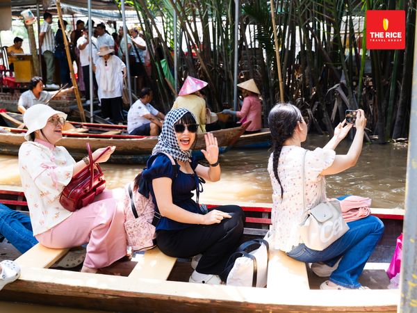 Guests can experience sitting in a boat under the cool shade of coconut trees.