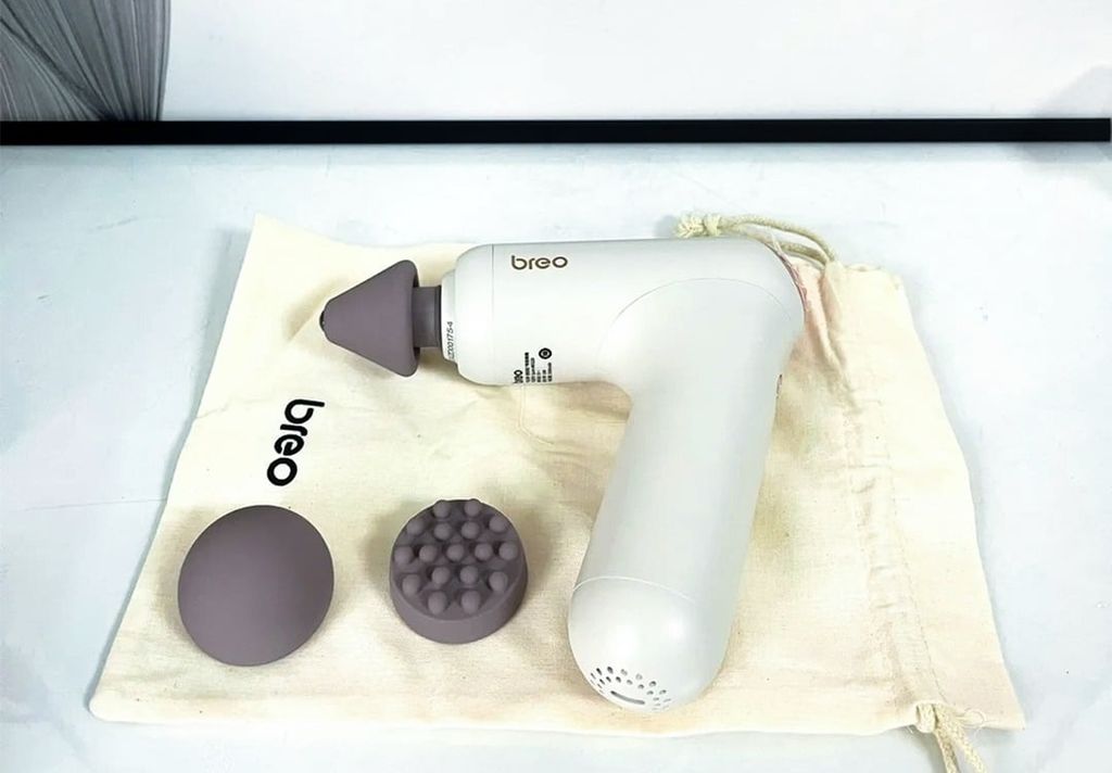 Súng massage được cấu tạo từ hai bộ phận chính là tay cầm và đầu massage