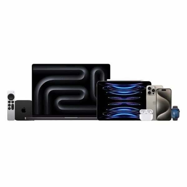 Group of Apple products including iPhone, iPad, and MacBook arranged together.