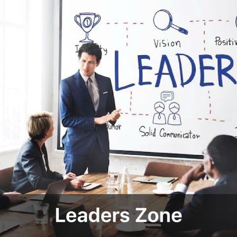 Leaders Zone image showing a presenter in a meeting room with leadership-related words on the wall.