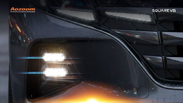 AOZOOM SQUARE V5 projector installed in a modern SUV headlight.