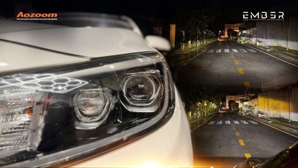 Kia Sedona parked in a suburban driveway at night with AOZOOM EMBER lights active.