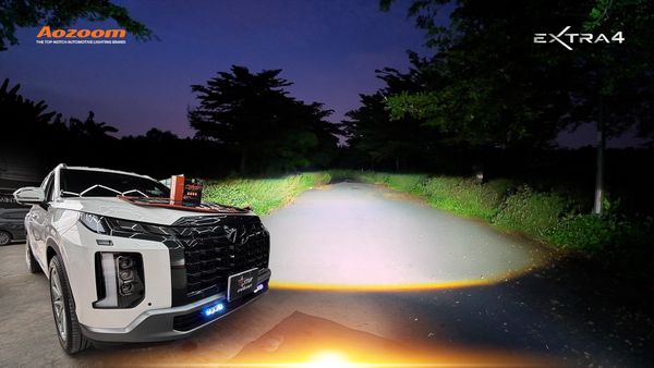 Hyundai Palisade at night with wide AOZOOM EX4 low beams on.
