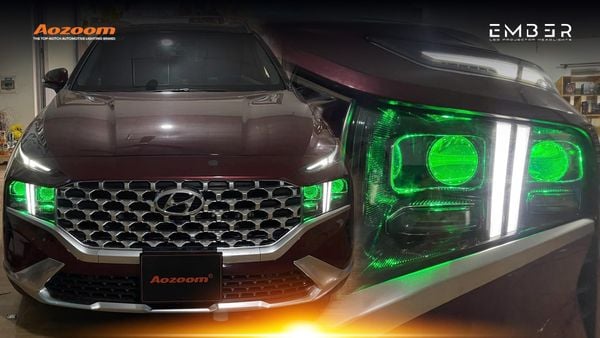 Hyundai Santa Fe driving through a misty mountain pass with AOZOOM EMBER upgrades.