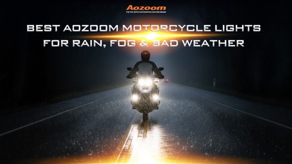 A motorcycle safely navigating a road in heavy rain with the help of high-quality AOZOOM headlights.