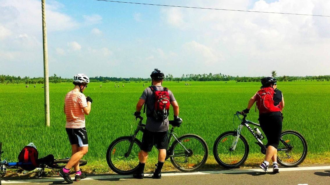 CYCLING THROUGH VIETNAM’S GREEN FIELDS AND COAST