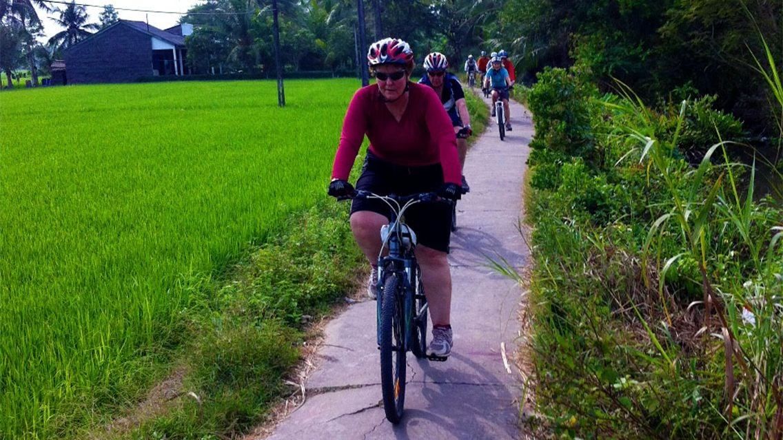 CYCLING THROUGH VIETNAM’S GREEN FIELDS AND COAST