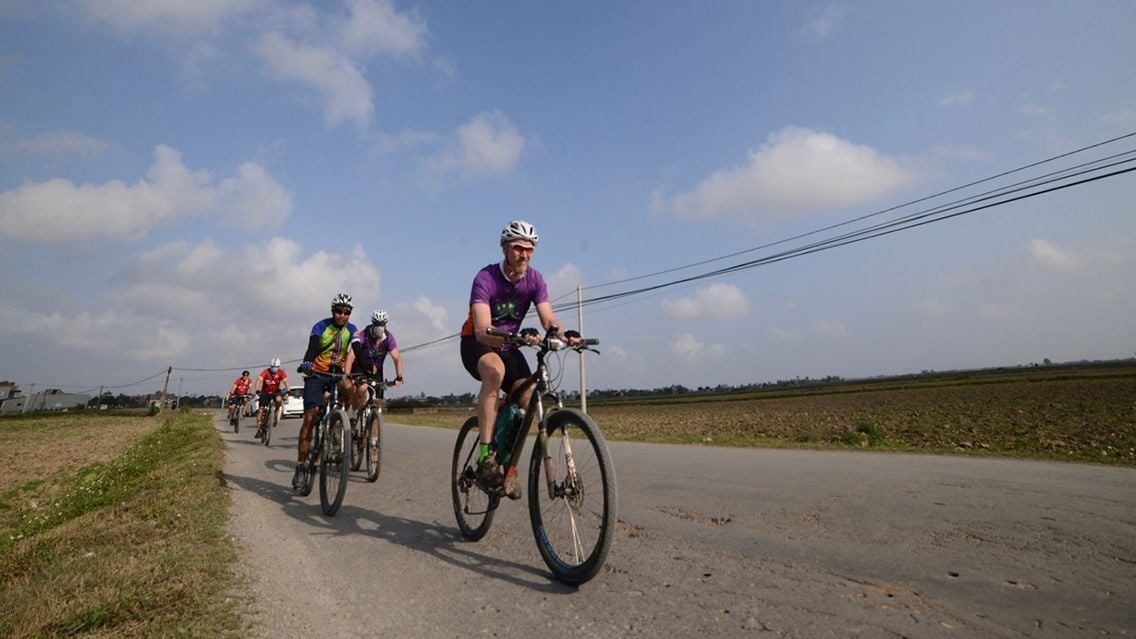 CYCLING THROUGH VIETNAM’S GREEN FIELDS AND COAST
