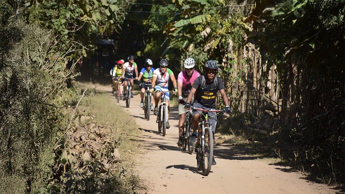 CYCLING THROUGH VILLAGES ALONG THE MEKONG IN LAOS