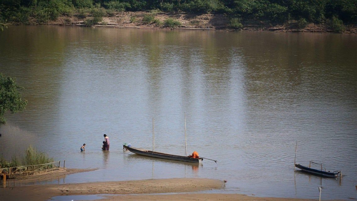 CYCLING THROUGH VILLAGES ALONG THE MEKONG IN LAOS