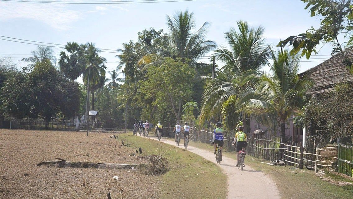 LAOS CYCLING JOURNEY THROUGH VILLAGES AND LOCAL LIFE
