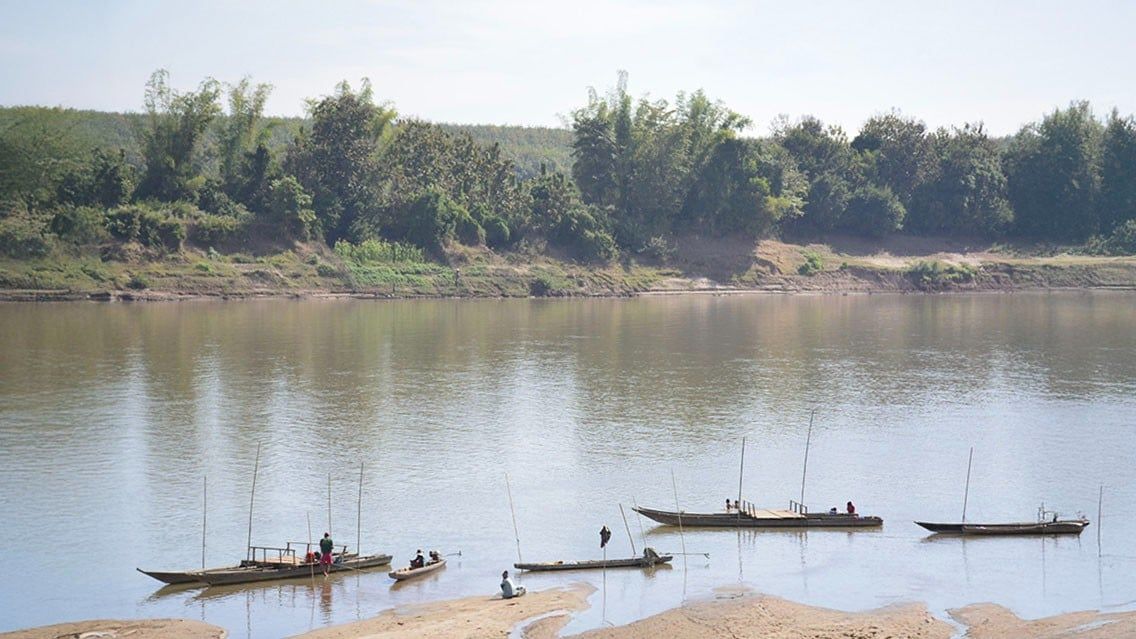 CYCLING THROUGH VILLAGES ALONG THE MEKONG IN LAOS