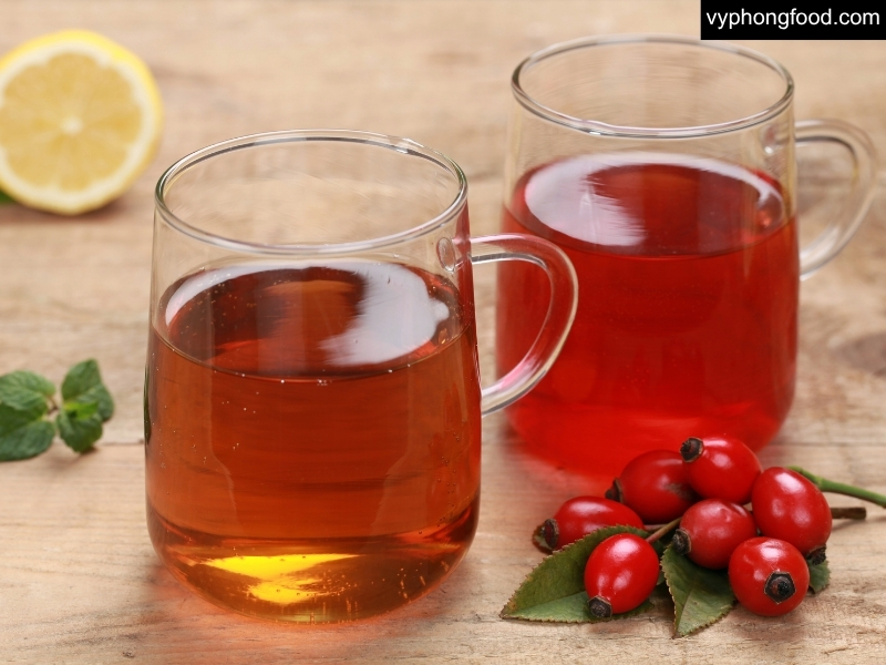Easter table with South African Rooibos tea in teabags, iced and latte drinks, pastel décor and herbs—an easy, healthy herbal tea party by African Dawn via vyphongfood.com.