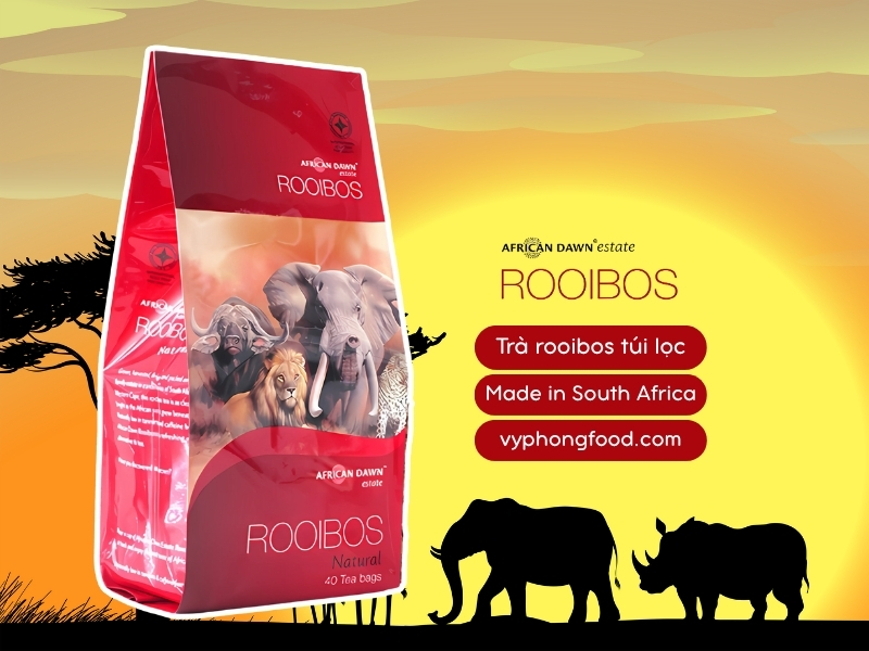 Easter table with South African Rooibos tea in teabags, iced and latte drinks, pastel décor and herbs—an easy, healthy herbal tea party by African Dawn via vyphongfood.com.