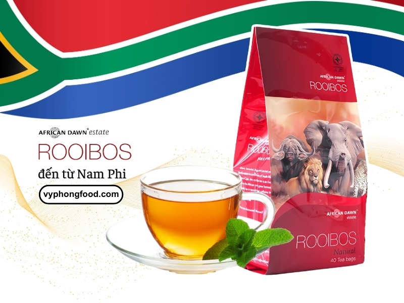 A glass of South African Rooibos tea served with fresh fruit and mint, highlighting refreshing summer drink ideas and health benefits.