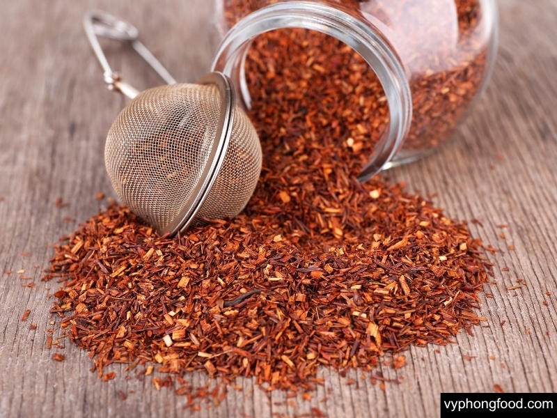 A warm cup of South African rooibos tea styled with heritage‑inspired elements, highlighting caffeine‑free, antioxidant benefits and African Dawn teabags for modern wellness and better sleep.