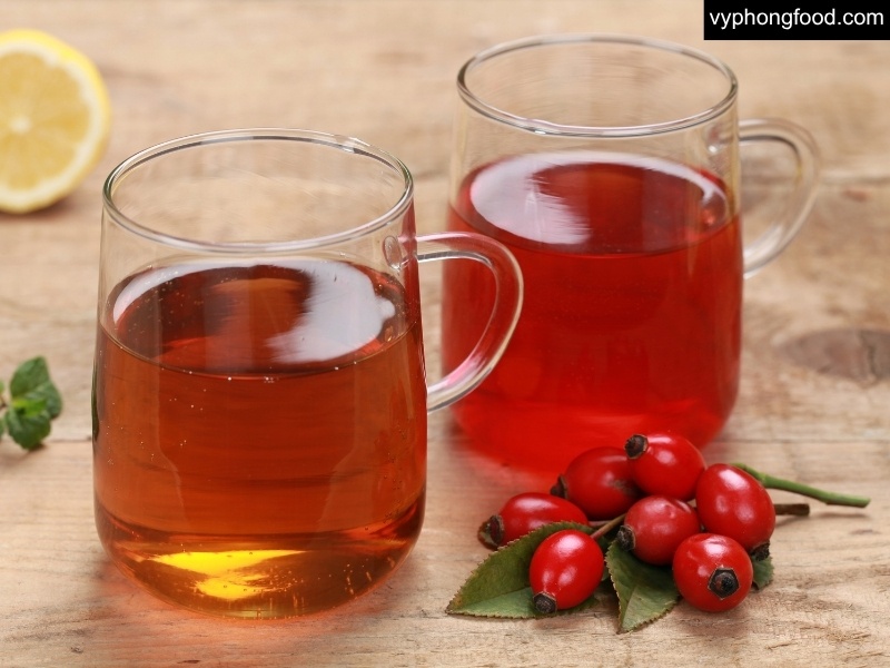 Steaming cup of South African Rooibos tea in teabag form on a winter table — caffeine-free, antioxidant-rich herbal drink for warmth, hydration, and immune support; perfect cozy beverage to keep warm this winter.