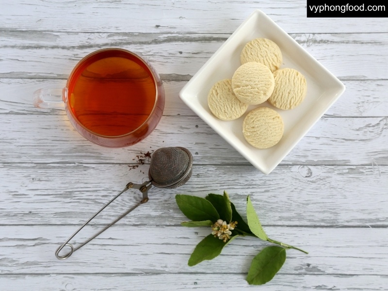 Steaming cup of South African Rooibos tea in teabag form on a winter table — caffeine-free, antioxidant-rich herbal drink for warmth, hydration, and immune support; perfect cozy beverage to keep warm this winter.