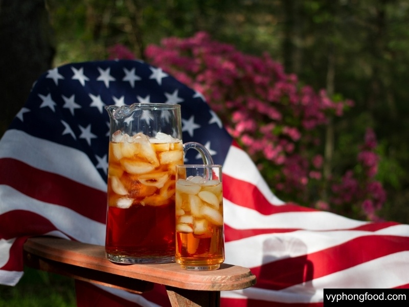 Assorted cups of South African Rooibos tea—some black, some with milk, hot and iced—showcasing a caffeine-free, antioxidant-rich herbal drink loved around the world for wellness and immune support.