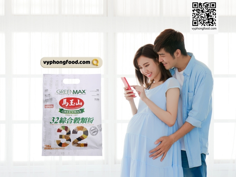 young vietnamese pregnant woman in her first trimester sitting indoors and reading online articles about whether it is safe to drink greenmax multigrain cereal as a healthy prenatal nutritional cereal powder, supporting product introduction and brand awareness for greenmax from vyphongfood.com.