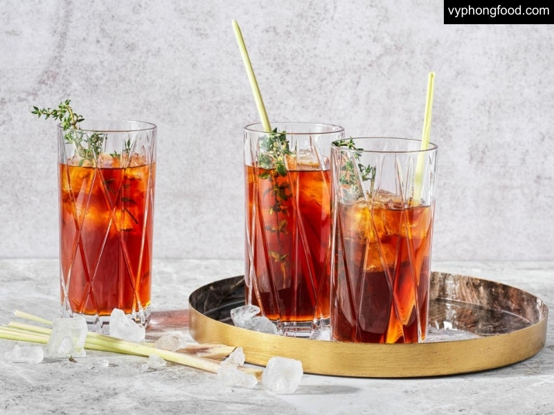 South African braai recipes infused with rooibos tea, including grilled chicken marinade, smoked fish, refreshing summer coolers, and desserts – showcasing the unique flavor and health benefits of rooibos tea.