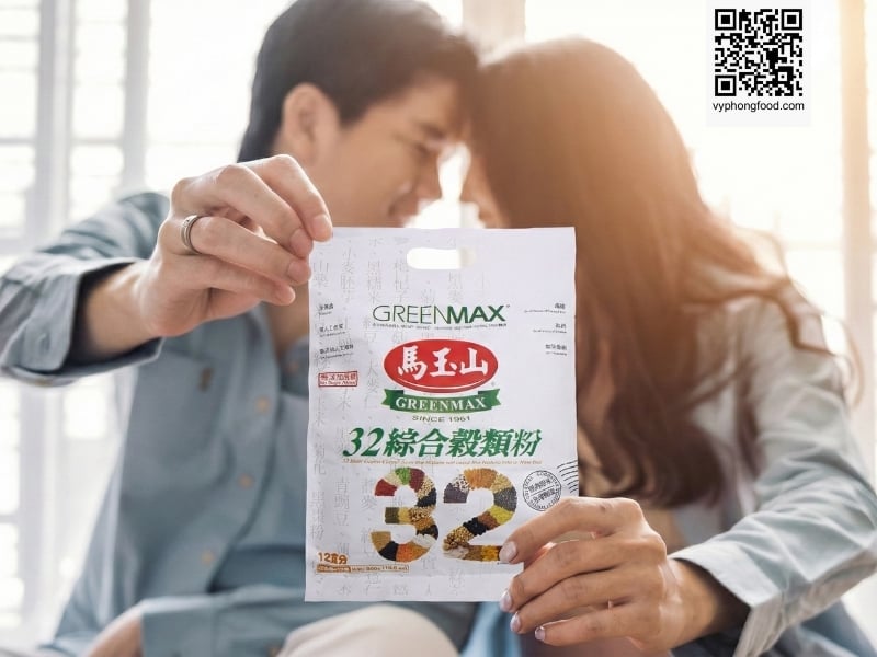 Pregnant woman at a desk reading information about nutritional cereal for pregnant women, considering Greenmax products from vyphongfood.com.