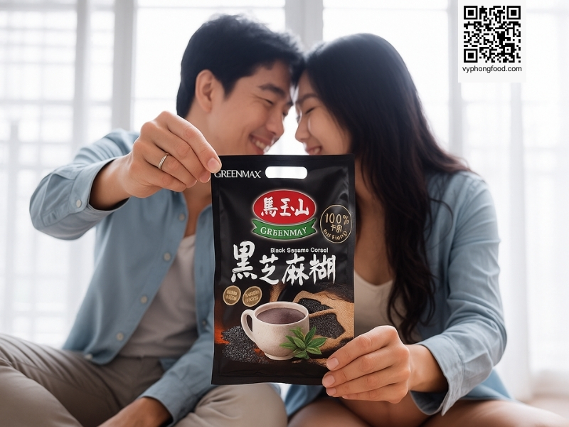 Pregnant woman at a desk reading information about nutritional cereal for pregnant women, considering Greenmax products from vyphongfood.com.