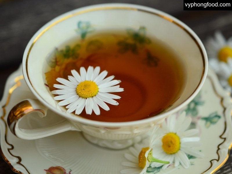 Cup of South African Rooibos (Red Bush) tea from the Cederberg, a caffeine-free herbal tea for menopause with aspalathin antioxidants supporting sleep, heart, and bone health.