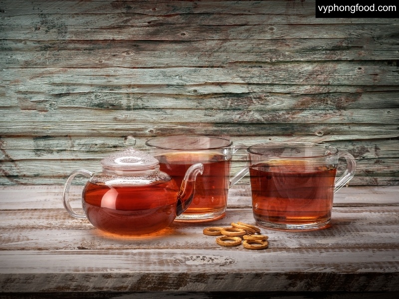 Cup of South African Rooibos (Red Bush) tea from the Cederberg, a caffeine-free herbal tea for menopause with aspalathin antioxidants supporting sleep, heart, and bone health.
