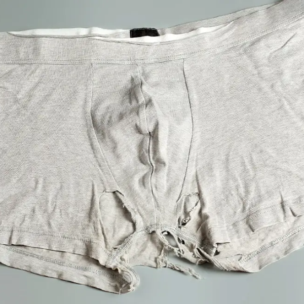 quần lót boxer cũ trắng bị rách