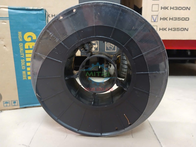 Mặt bên cuộn dây hàn Kim Tín Gemini GM-70S 15kg dùng kiểm tra kết cấu cuộn