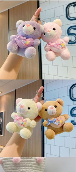 MÓC KHÓA TEDDY ÔM TIM